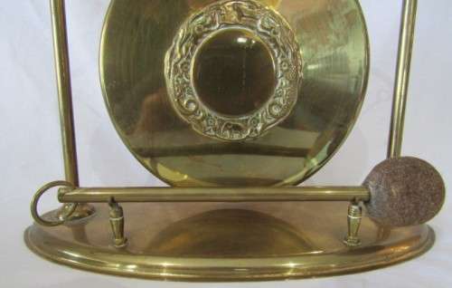 A stunning vintage brass dinner gong on a stand with a mallet, lovely on display or for use!