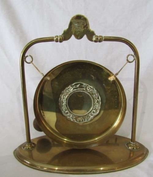 A stunning vintage brass dinner gong on a stand with a mallet, lovely on display or for use!