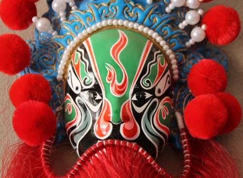 A colourful Beijing made wall hanging mini opera mask in a presentation box! Lifespace Sale