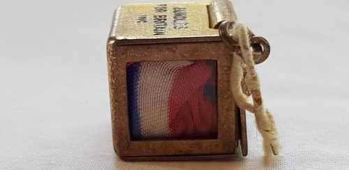 An exceptionally rare antique British (1940s) Bundles for Britain "Union Jack flag" charm.