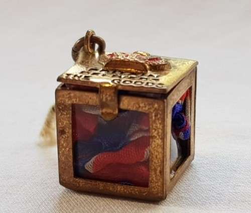 An exceptionally rare antique British (1940s) Bundles for Britain "Union Jack flag" charm.