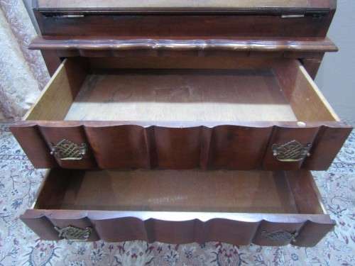 An elegant vintage ball and claw writing bureau w/ two large drawers & pigeon holes. Beautiful!!
