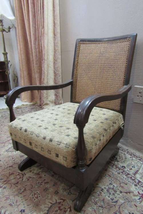 A gorgeous vintage Imbuia rattan backed rocking chair, fantastic in a sun room, patio, porch!!