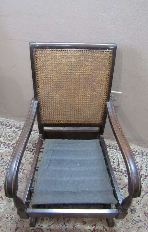 A gorgeous vintage Imbuia rattan backed rocking chair, fantastic in a sun room, patio, porch!!