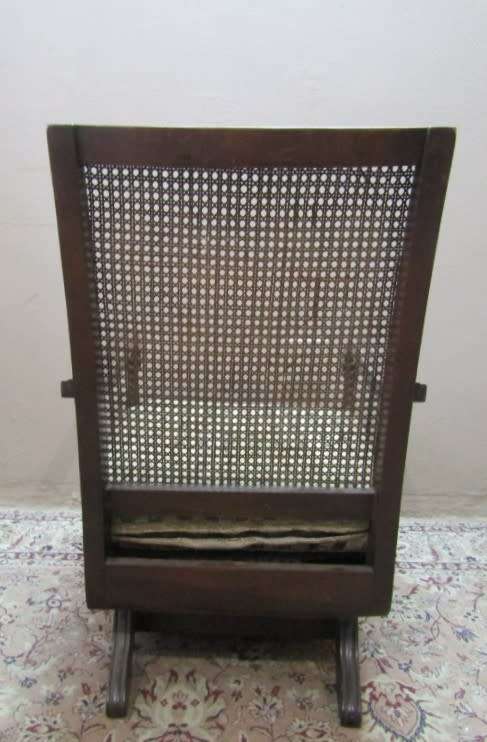 A gorgeous vintage Imbuia rattan backed rocking chair, fantastic in a sun room, patio, porch!!