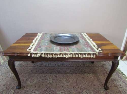 An exquisite solid Teak, scalloped edge, Queen Anne footed 6-seater dining table.