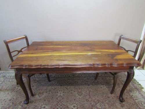 An exquisite solid Teak, scalloped edge, Queen Anne footed 6-seater dining table.