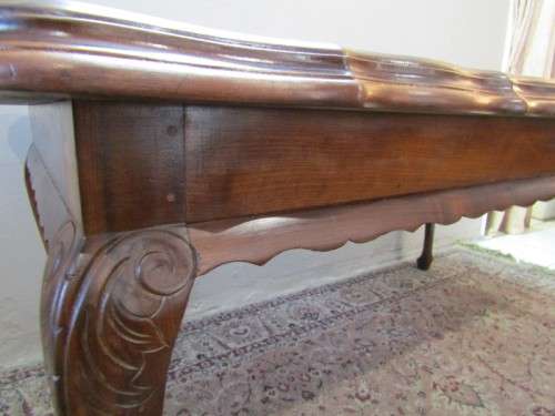 An exquisite solid Teak, scalloped edge, Queen Anne footed 6-seater dining table.