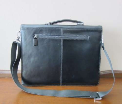 A beautiful genuine leather ladies hand bag with place for books, cards etc