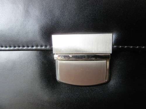A beautiful genuine leather ladies hand bag with place for books, cards etc