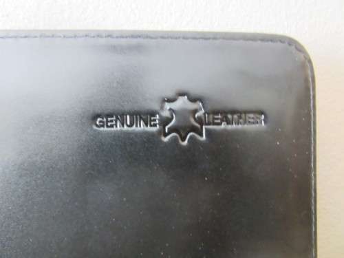 A beautiful genuine leather ladies hand bag with place for books, cards etc