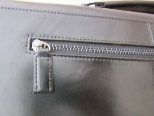A beautiful genuine leather ladies hand bag with place for books, cards etc