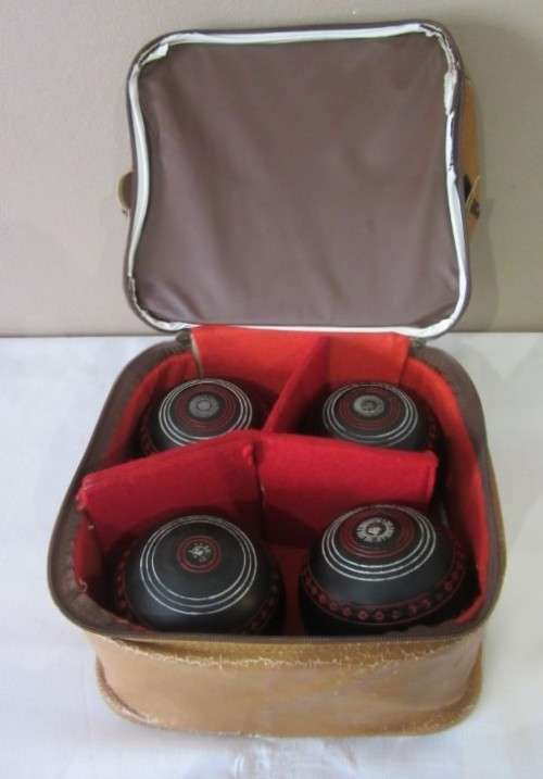 An awesome set of four South African "Henselite" bowling balls in a carry bag,size 4.
