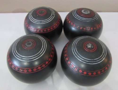 An awesome set of four South African "Henselite" bowling balls in a carry bag,size 4.