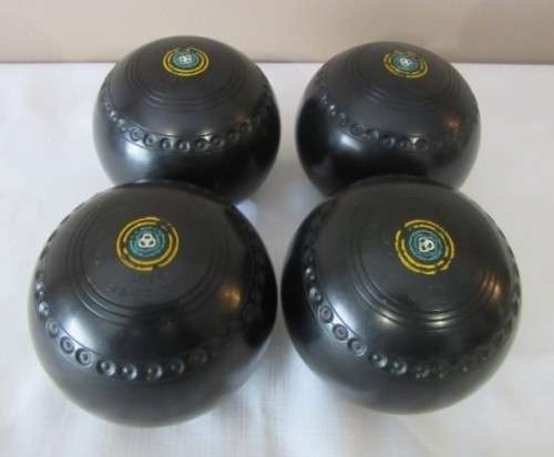 An awesome set of four South African "Henselite" bowling balls (super grip) in a carry bag size 6