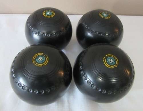 An awesome set of four South African "Henselite" bowling balls (super grip) in a carry bag size 6