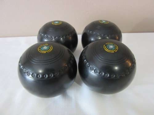 An awesome set of four South African "Henselite" bowling balls (super grip) in a carry bag size 6