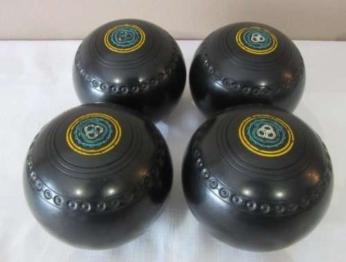 An awesome set of four South African "Henselite" bowling balls (super grip) in a carry bag size 6