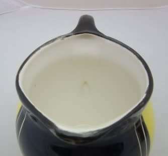 A gorgeous, colourful ceramic jug, "Lesedi pottery made in S-Africa, Cape Town". Lifespace Sale
