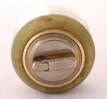A gorgeous vintage (1960s) Colibri Onyx marble table lighter.