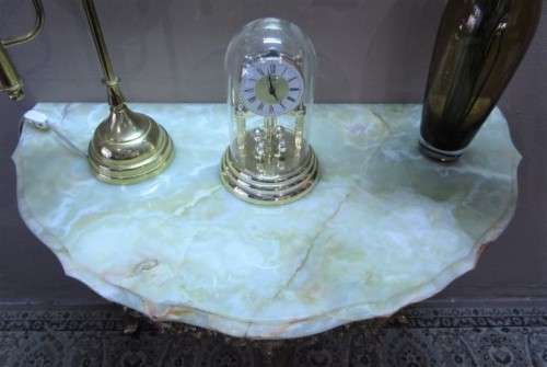 An exquisite moulded solid brass mirror & marble half moon table with ornate detailing. Wow!!!