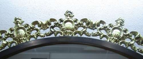 An exquisite moulded solid brass mirror & marble half moon table with ornate detailing. Wow!!!