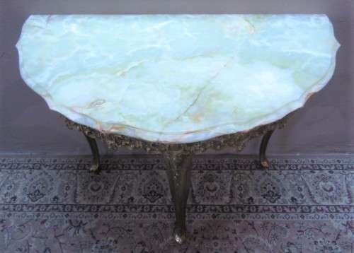 An exquisite moulded solid brass mirror & marble half moon table with ornate detailing. Wow!!!