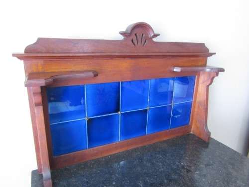 A wonderful vintage solid Oak double door wash stand with a black marble top on castors - stunning!!