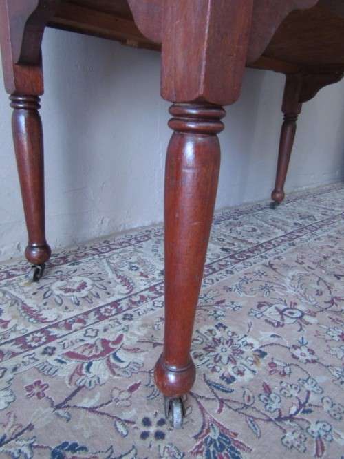 A wonderful vintage solid Oak double door wash stand with a black marble top on castors - stunning!!