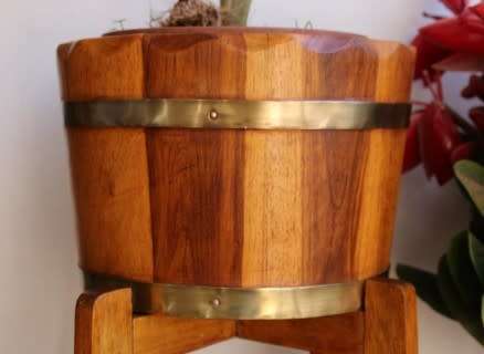 A superb vintage Teak double planter stand with a brass-ring bowl in wonderful condition.