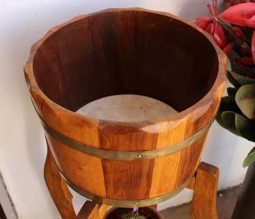 A superb vintage Teak double planter stand with a brass-ring bowl in wonderful condition.