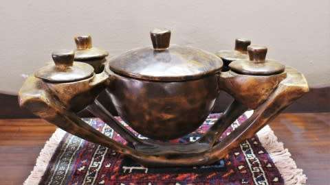 A  large hand carved teak serving bowl, with 4 bowls & 1 larger bowl in the center! Lifespace Sale
