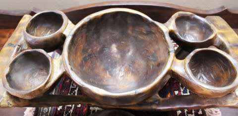 A  large hand carved teak serving bowl, with 4 bowls & 1 larger bowl in the center! Lifespace Sale