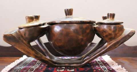 A  large hand carved teak serving bowl, with 4 bowls & 1 larger bowl in the center! Lifespace Sale