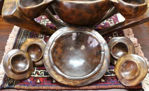 A  large hand carved teak serving bowl, with 4 bowls & 1 larger bowl in the center! Lifespace Sale