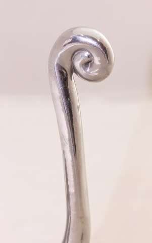 A stunning aluminium Carrol Boyes wall hook, gorgeous in any room!