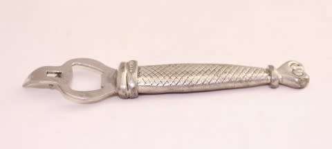 A stunning stainless steel Carrol Boyes bottle opener, gorgeous and functional!