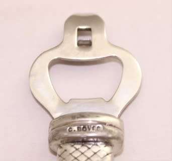 A stunning stainless steel Carrol Boyes bottle opener, gorgeous and functional!