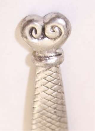 A stunning stainless steel Carrol Boyes bottle opener, gorgeous and functional!