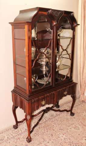An exquisitely made Imbuia wood display cabinet with glass doors and shelves, absolutely gorgeous!