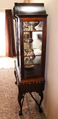 An exquisitely made Imbuia wood display cabinet with glass doors and shelves, absolutely gorgeous!
