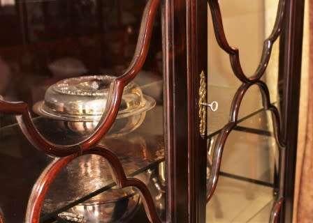 An exquisitely made Imbuia wood display cabinet with glass doors and shelves, absolutely gorgeous!