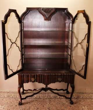 An exquisitely made Imbuia wood display cabinet with glass doors and shelves, absolutely gorgeous!