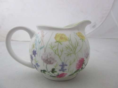 A gorgeous made in England "Nina Campbell" fine bone china milk jug/ creamer Meadow Flower pattern.