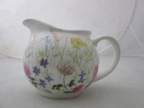 A gorgeous made in England "Nina Campbell" fine bone china milk jug/ creamer Meadow Flower pattern.