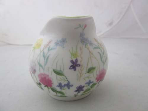 A gorgeous made in England "Nina Campbell" fine bone china milk jug/ creamer Meadow Flower pattern.