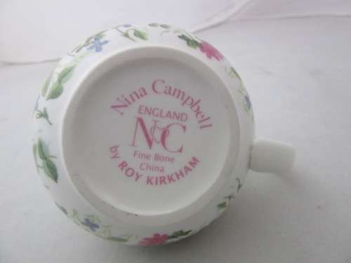 A gorgeous made in England "Nina Campbell" fine bone china milk jug/ creamer Meadow Flower pattern.