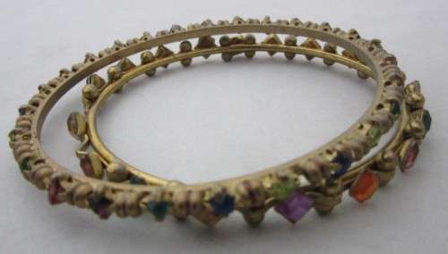A pretty colorful pair of Indian kids bangles.