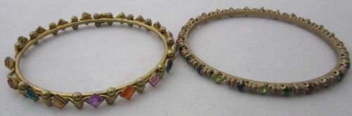 A pretty colorful pair of Indian kids bangles.
