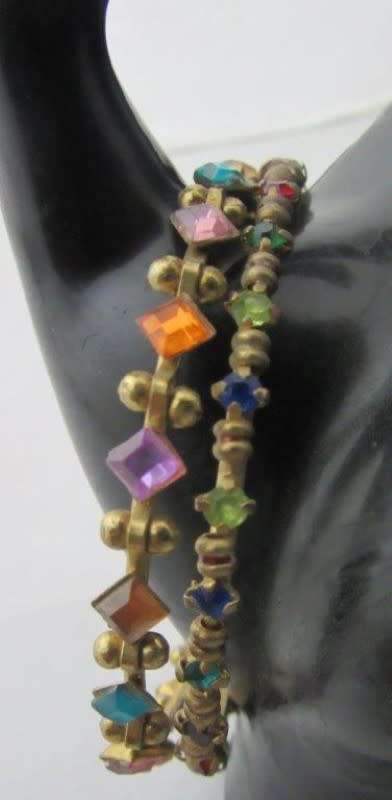 A pretty colorful pair of Indian kids bangles.